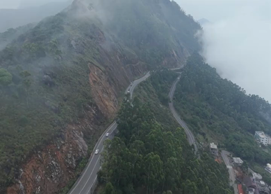 Aerial View of Scenic Mountain Roads and Tea Plantations in Munnar, Kerala, India