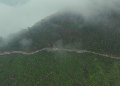 Aerial View of Scenic Mountain Roads and Tea Plantations in Munnar, Kerala, India