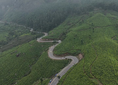 Aerial View of Scenic Mountain Roads and Tea Plantations in Munnar, Kerala, India