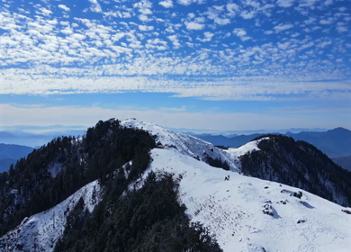 Aerial View of Snow Covered Brahmatal and Himalayan Mountain Range Uttarakhand India