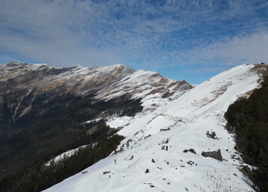 Aerial View of Snow Covered Brahmatal and Himalayan Mountain Range Uttarakhand India