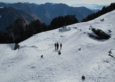 Aerial View of Snow Covered Brahmatal and Himalayan Mountain Range Uttarakhand India