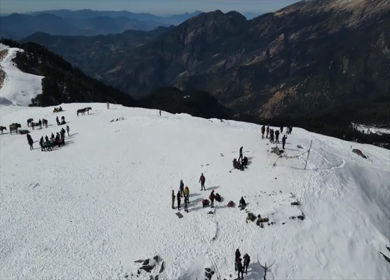 Aerial View of Snow Covered Brahmatal and Himalayan Mountain Range Uttarakhand India