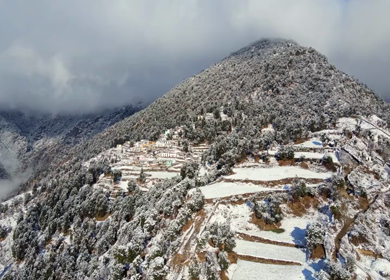 Aerial View of Snow Covered Brahmatal and Himalayan Mountain Range Uttarakhand India