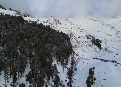 Aerial View of Snow Covered Brahmatal and Himalayan Mountain Range Uttarakhand India