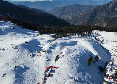 Aerial View of Snow Covered Brahmatal and Himalayan Mountain Range Uttarakhand India