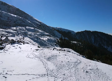 Aerial View of Snow Covered Brahmatal and Himalayan Mountain Range Uttarakhand India