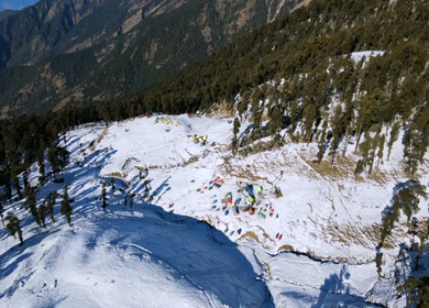 Aerial View of Snow Covered Brahmatal and Himalayan Mountain Range Uttarakhand India