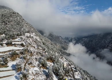 Aerial View of Snow Covered Village Houses in Brahmatal Uttarakhand India