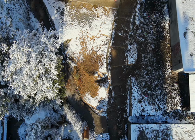 Aerial View of Snow Covered Village Houses in Brahmatal Uttarakhand India