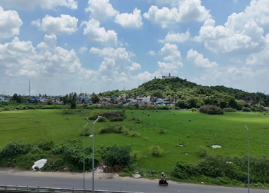 Aerial View of Thiruneermalai Temple and Chennai Cityscape