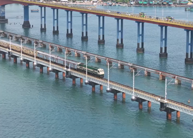 Aerial View of Train Crossing Pamban Railway Bridge in Rameswaram Tamil Nadu India
