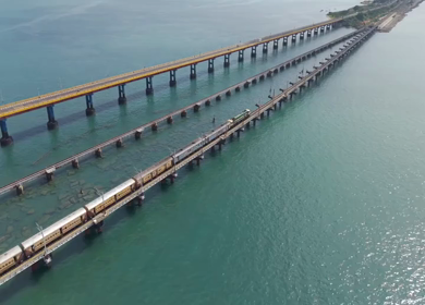 Aerial View of Train Crossing Pamban Railway Bridge in Rameswaram Tamil Nadu India