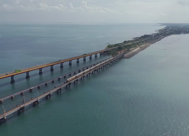 Aerial View of Train Crossing Pamban Railway Bridge in Rameswaram Tamil Nadu India