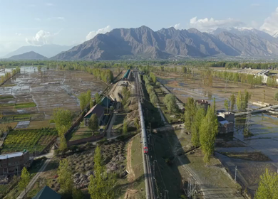 Aerial View of Train Passing Pampore Station in Srinagar Kashmir