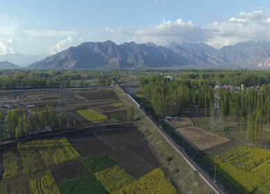 Aerial View of Train Passing Pampore Station in Srinagar Kashmir