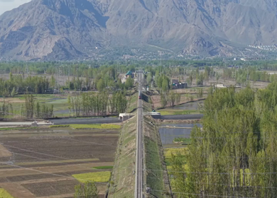 Aerial View of Train Passing Pampore Station in Srinagar Kashmir