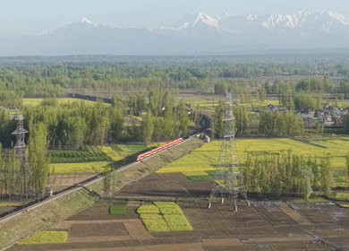 Aerial View of Train Passing Pampore Station in Srinagar Kashmir