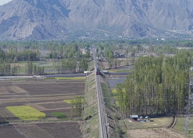 Aerial View of Train Passing Pampore Station in Srinagar Kashmir
