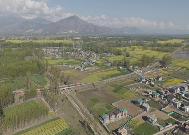Aerial View of Train Passing Pampore Station in Srinagar Kashmir