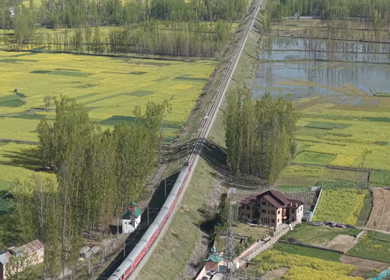 Aerial View of Train Passing Pampore Station in Srinagar Kashmir