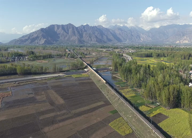 Aerial View of Train Passing Pampore Station in Srinagar Kashmir