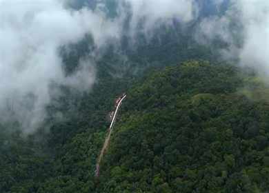 Aerial View of Train Passing Through Misty Forest in Kanyakumari Tamil Nadu