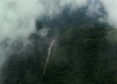 Aerial View of Train Passing Through Misty Forest in Kanyakumari Tamil Nadu