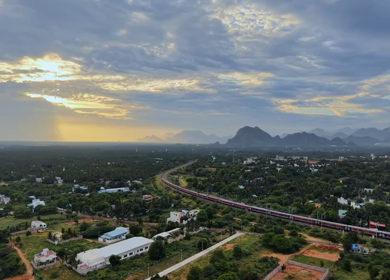 Aerial View of Train and Coastal Landscape with Mountains in Kanyakumari Tamil Nadu