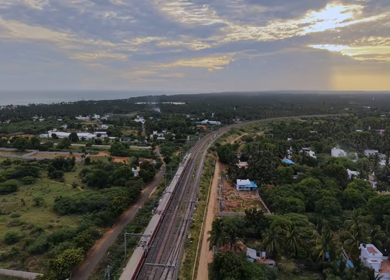 Aerial View of Train and Coastal Landscape with Mountains in Kanyakumari Tamil Nadu
