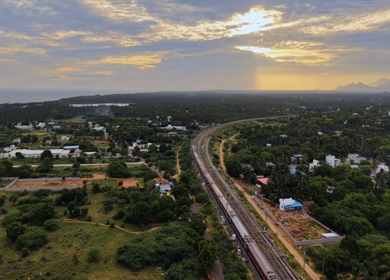 Aerial View of Train and Coastal Landscape with Mountains in Kanyakumari Tamil Nadu