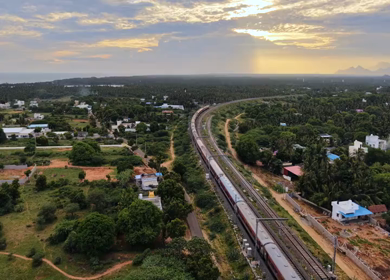 Aerial View of Train and Coastal Landscape with Mountains in Kanyakumari Tamil Nadu