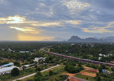Aerial View of Train and Coastal Landscape with Mountains in Kanyakumari Tamil Nadu