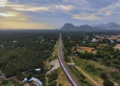 Aerial View of Train and Coastal Landscape with Mountains in Kanyakumari Tamil Nadu