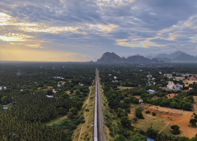 Aerial View of Train and Coastal Landscape with Mountains in Kanyakumari Tamil Nadu