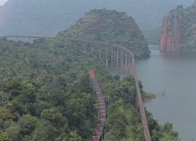 Aerial View of Train on Curved Railway Bridge in JSW Sandur Karnataka India