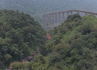 Aerial View of Train on Curved Railway Bridge in JSW Sandur Karnataka India