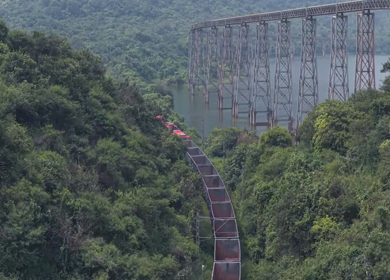 Aerial View of Train on Curved Railway Bridge in JSW Sandur Karnataka India