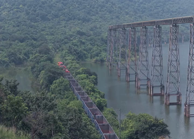 Aerial View of Train on Curved Railway Bridge in JSW Sandur Karnataka India
