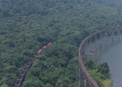 Aerial View of Train on Curved Railway Bridge in JSW Sandur Karnataka India