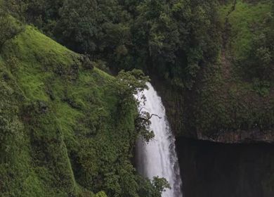 Aerial View of Waterfall in Misty Green Hills of Maharashtra