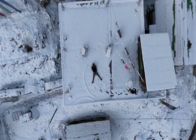 Aerial View snow covered rooftops in Lachen village North Sikkim, India