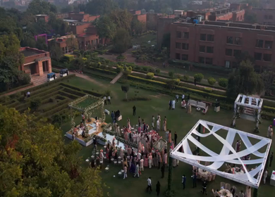 Aerial drone shot capturing traditional Indian wedding rituals during a grand ceremony