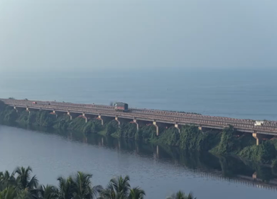 Aerial drone shot of Maravanthe Beach Road in Karnataka India