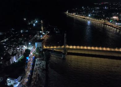 Aerial night shot of Janki Setu bridge over Ganges River in Rishikesh India