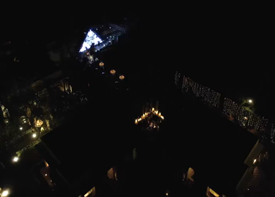 Aerial night shot of a live concert performance at a Big Fat Indian wedding in India