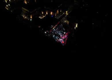 Aerial night shot of a live concert performance at a Big Fat Indian wedding in India