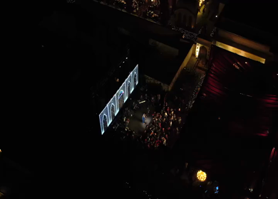 Aerial night shot of a live concert performance at a Big Fat Indian wedding in India