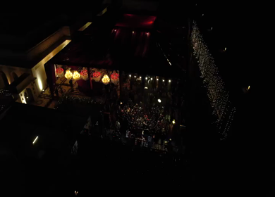 Aerial night shot of a live concert performance at a Big Fat Indian wedding in India