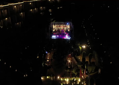 Aerial night shot of a live concert performance at a Big Fat Indian wedding in India